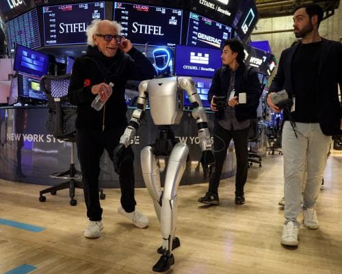 Tech shares slide after SoftBank sells Nvidia stake; UK interest rate cut expected in December – as it happened