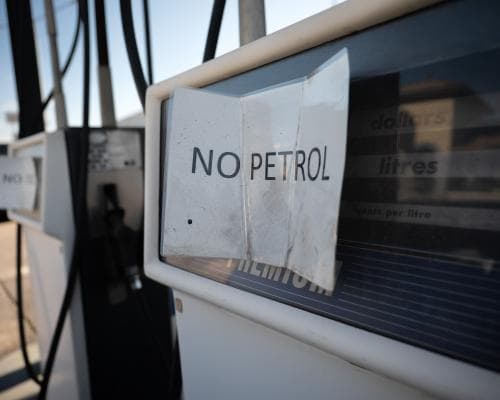 Dozens of petrol stations around Australia run out of fuel as panic-buying continues